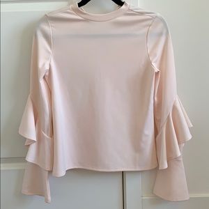 Light pink long sleeve blouse with bell sleeves